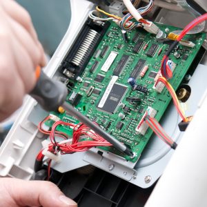 Electronic manufacture box-build assembly screwing populated pcb into assembly
